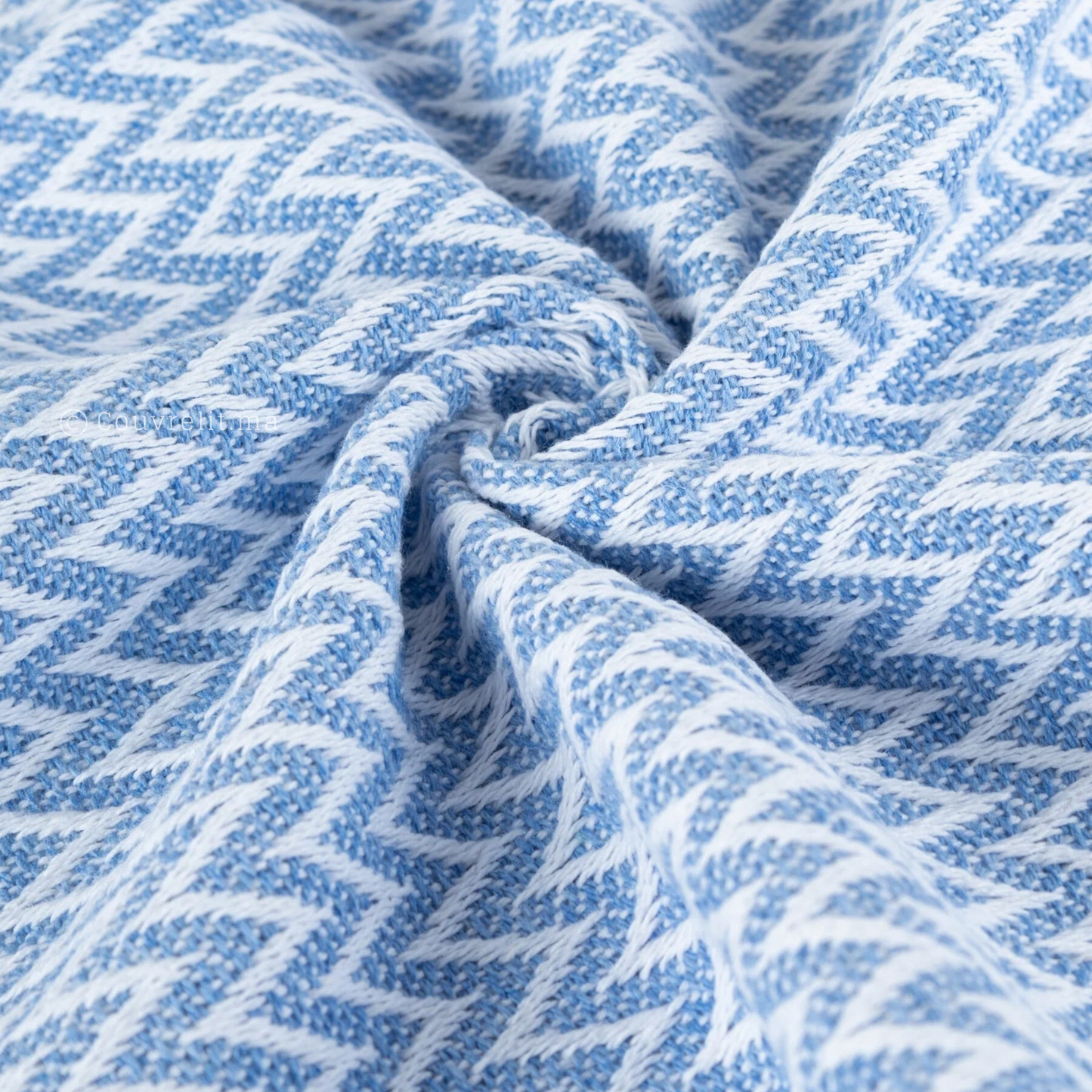 Jeté en coton tissé avec motifs chevrons et franges